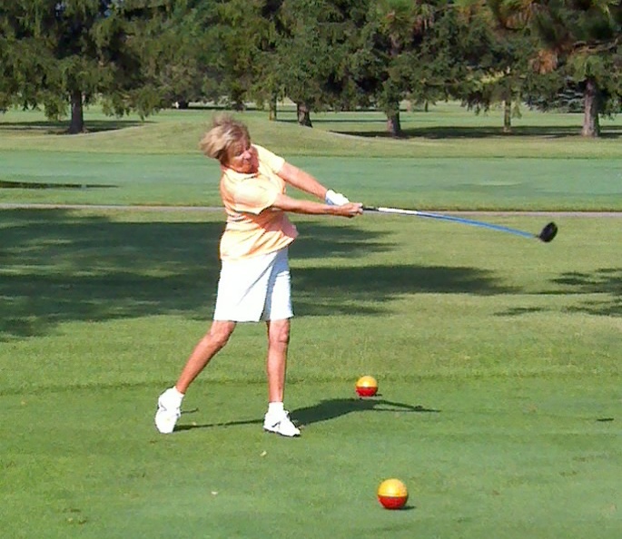 Norma Kinsey eys down her drive en route to a 2nd place finish in the Net Division.